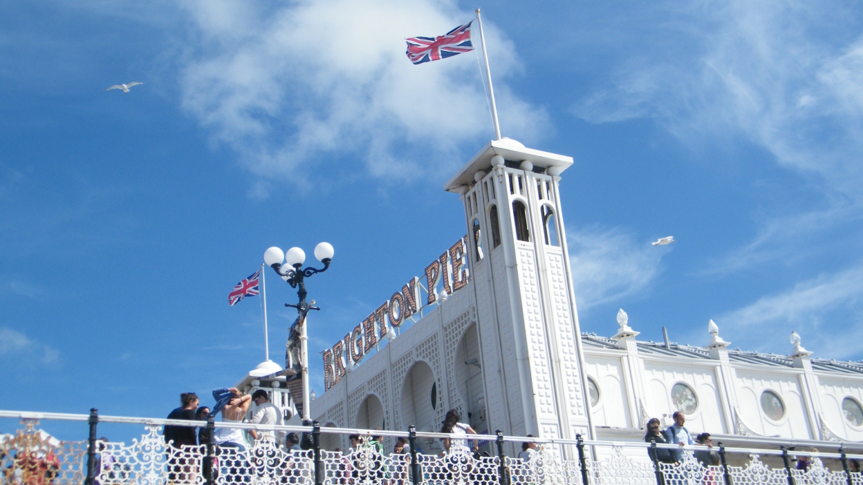close up view of Brighton pier, blue sky in background