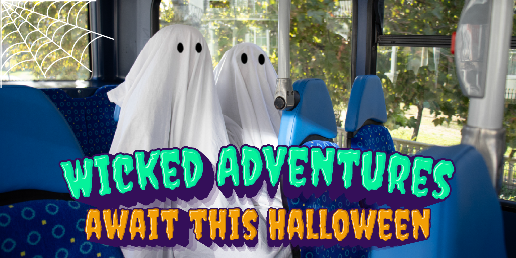 two ghosts sitting on a bus with a halloween graphic overlaid