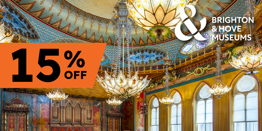 ornate ceiling with chandeliers and a logo overlaid
